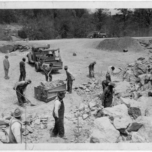 Work songs Du son sur tes tartines Prisoners breaking up rocks at a prison camp or road construction site.jpg